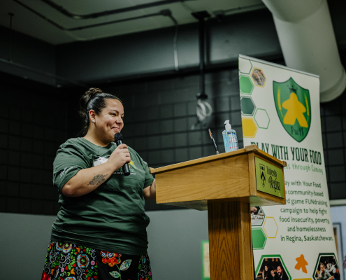 Chelsea Steebock, 2026 Chair of PwYF addressing the attendees at the 24 Hour event